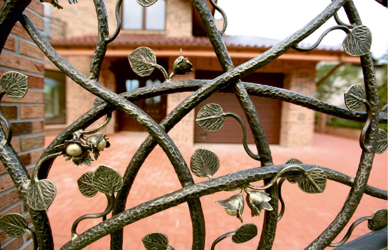 Forged metal, coated with hot zinc, painted