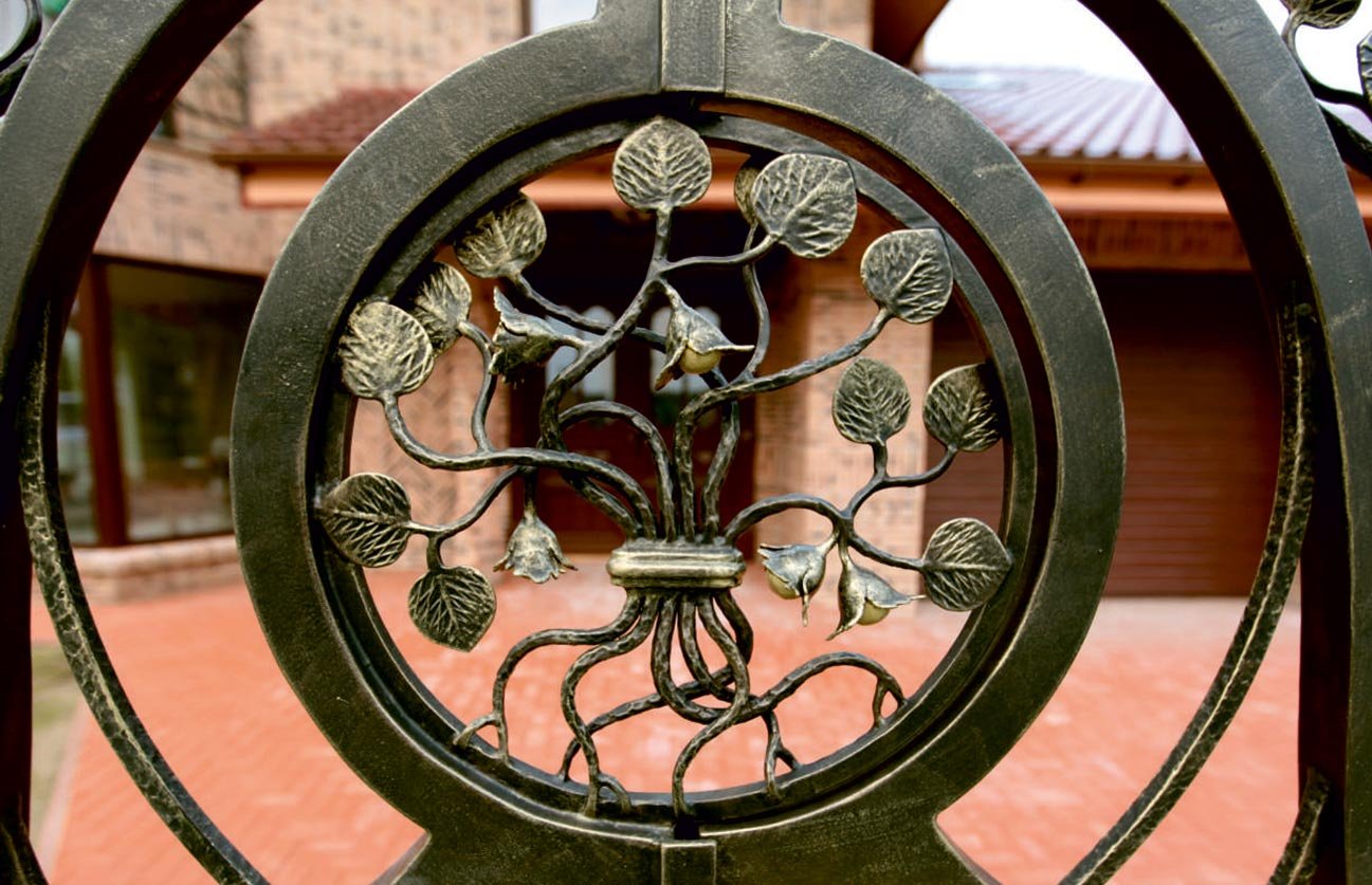 Forged metal, coated with hot zinc, painted
