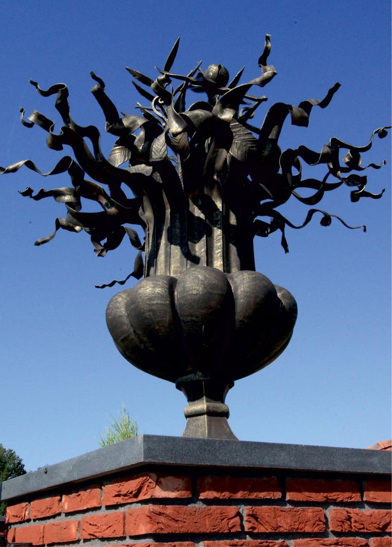 Forged metal, coated with hot zinc, painted